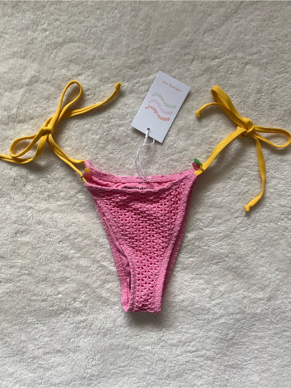 Dippin’ Daisy’s Pink Bikini Bottom with Yellow Tie